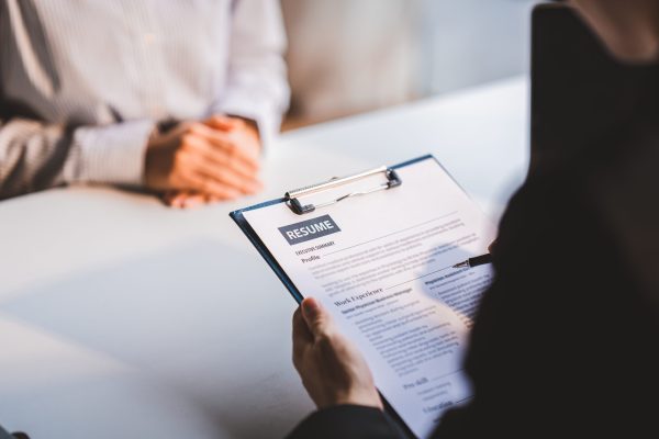 Portrait of a person interviewing for a job and.Submit resume to staff job application concept